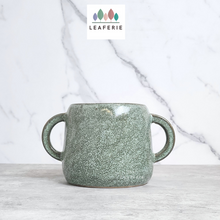 Load image into Gallery viewer, The Leaferie Naoki green plant pot with 2 handles. ceramic material. front view