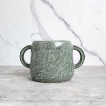 Load image into Gallery viewer, The Leaferie Naoki green plant pot with 2 handles. ceramic material. front view close up