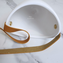 Load image into Gallery viewer, The Leaferie PAtina hanging planter. material ceramic.white colour with leather strap. no drainage hole. view of inside