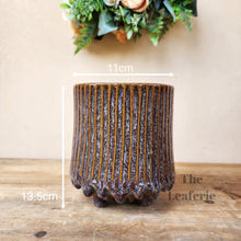 Load image into Gallery viewer, The Leaferie Ide pot. purple ceramic pot with studs at the bottom.
