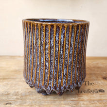 Load image into Gallery viewer, The Leaferie Ide pot. purple ceramic pot with studs at the bottom.