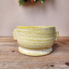 Load image into Gallery viewer, The Leaferie Caiomhe pot. yellowe shallow ceramic plant pot. front view. close up