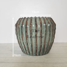 Load image into Gallery viewer, The Leaferie Brise plant pot . green ceramic pot . front view. size