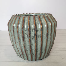 Load image into Gallery viewer, The Leaferie Brise plant pot . green ceramic pot . front view. close up