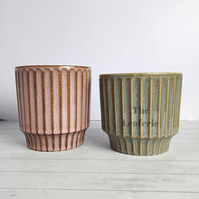 Load image into Gallery viewer, The Leaferie Romain pot. red and green colour . ceramic planter. front view of both pot