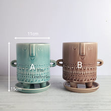 Load image into Gallery viewer, The Leaferie Deidre plant pot with tray. comes in 2 colours . Front view of designs and size