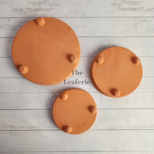 Load image into Gallery viewer, The Leaferie Terracotta round trays with stand . 3 sizes. bottom view