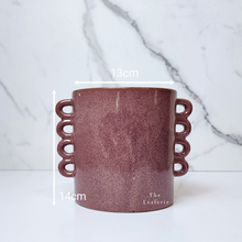 Load image into Gallery viewer, The Leaferie Juro red planter with many handles. ceramic material front view of pot and size