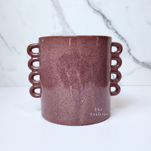 Load image into Gallery viewer, The Leaferie Juro red planter with many handles. ceramic material front view of pot