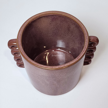 Load image into Gallery viewer, The Leaferie Juro red planter with many handles. ceramic material top view of pot