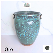Load image into Gallery viewer, Oro Speckled green ceramic vase with 'LEAFAERIE' branding on a white background