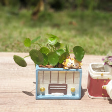 Load image into Gallery viewer, The Leaferie Retro flowerpot. resin material. radio and camera design
