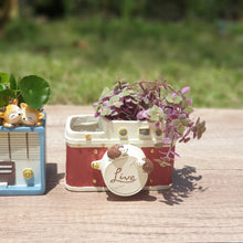 Load image into Gallery viewer, The Leaferie Retro flowerpot. resin material. radio and camera design