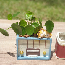 Load image into Gallery viewer, The Leaferie Retro flowerpot. resin material. radio and camera design