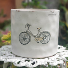 Load image into Gallery viewer, The Leaferie colson bicycle plant pot. ceramic bike planter . front view