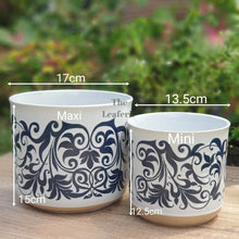 Load image into Gallery viewer, The Leaferie Asti Flowerpot . Front view of planter. Blue fllowery design. Measurement