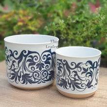 Load image into Gallery viewer, The Leaferie Asti Flowerpot . Front view of planter. Blue fllowery design.