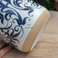 Load image into Gallery viewer, The Leaferie Asti Flowerpot . Bottom view of planter. Blue fllowery design.