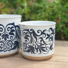 Load image into Gallery viewer, The Leaferie Asti Flowerpot . Front view of planter. Blue fllowery design.