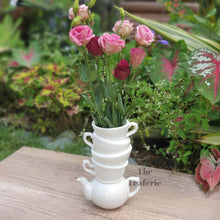 Load image into Gallery viewer, The Leaferie Calla vase. ceramic cup stacked cup design . Pearlescent colour . front view with flowers
