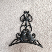 Load image into Gallery viewer, The Leaferie cast iron water hose holder. front view