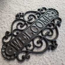 Load image into Gallery viewer, The Leaferie Cast Iron HOME welcome sign. side view
