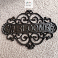 Load image into Gallery viewer, The Leaferie Cast Iron HOME welcome sign. front view