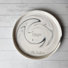 Load image into Gallery viewer, The Leaferie Marbled like round ceramic trays. 6 designs. white marble . top view of size 18cm