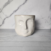 Load image into Gallery viewer, The Leaferie Faustine face white ceramic pot. front view
