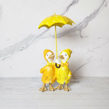 Load image into Gallery viewer, The Leaferie Damien the duck garden decoration.Yellow ducks with umbrella. 2 designs front view design A