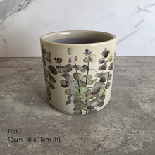 Load image into Gallery viewer, Collection of As-Is Feb 26 ceramic pots with various designs and colors Leaferie brand.
