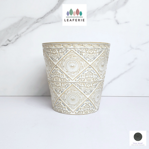 The Leaferie Vestaria white ceramic pot