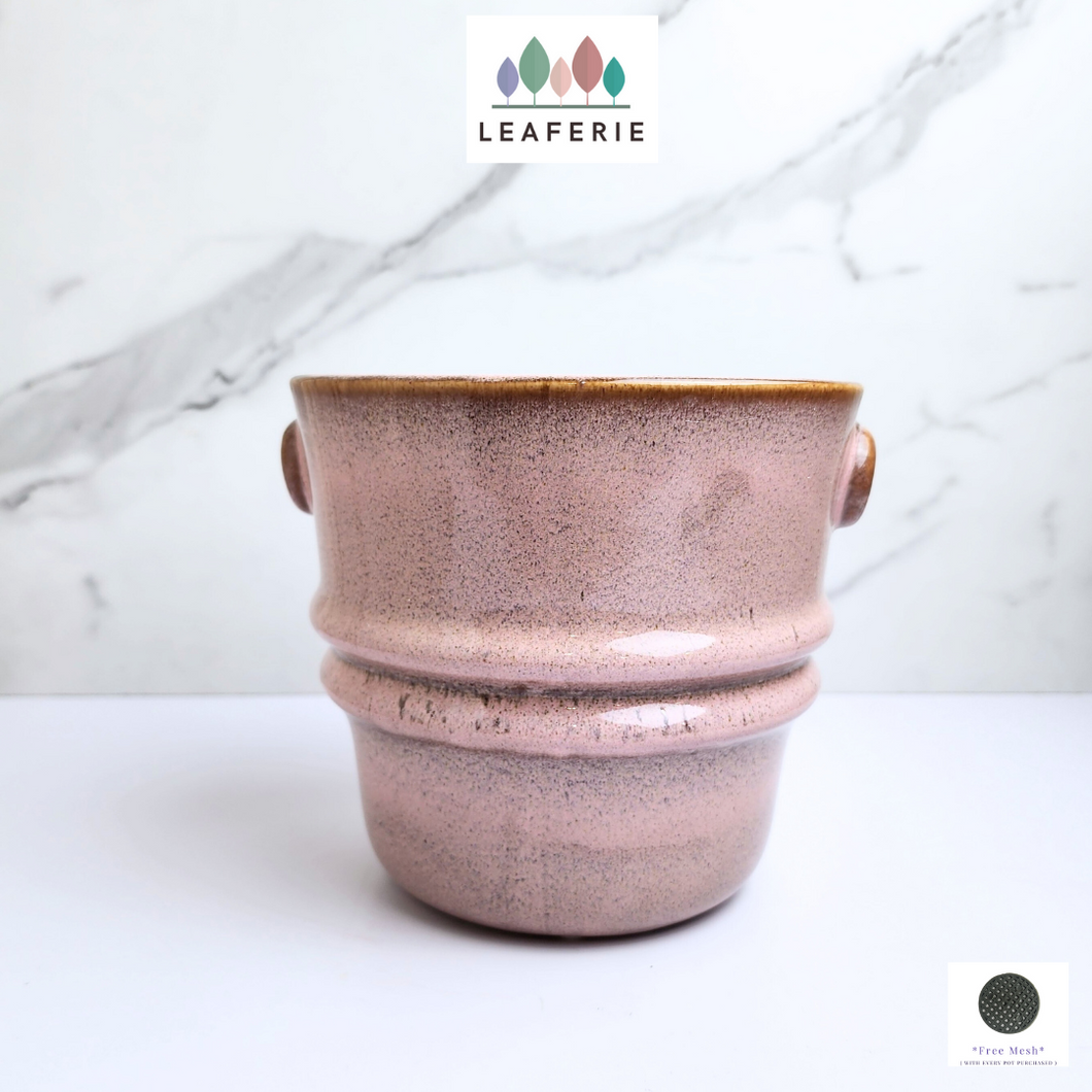 The Leaferie Xenia pink flowerpot. ceramic