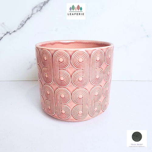 The Leaferie 70s ceramic pot in pink