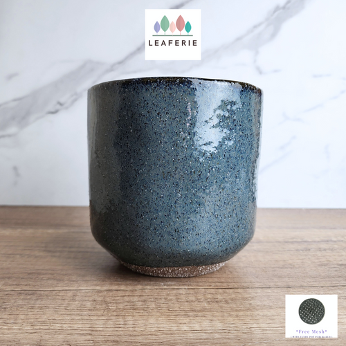 The Leaferie Esfir Blue ceramic pot.