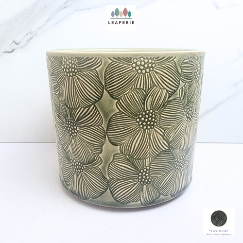 The Leaferie Alva green floral ceramic pot.