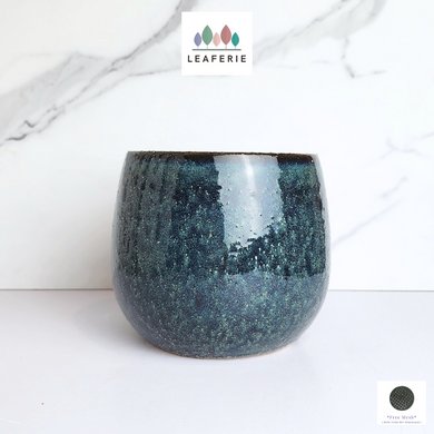 The Leaferie Dale blue pot. ceramic material