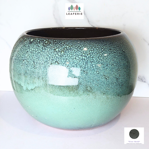 The Leaferie Armstrong Big Flowerpot. green ceramic material