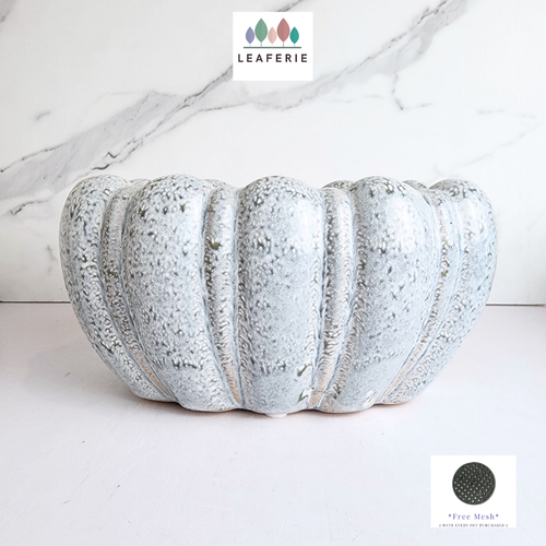 The Leaferie Bria shallow blue pot. ceramic material