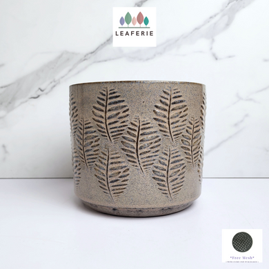 Makela Pot .ceramic material. grey pot with leaf motif