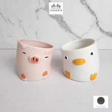 Load image into Gallery viewer, The Leaferie Odell flowerpot . 2 designs pink and white ceramic pot.
