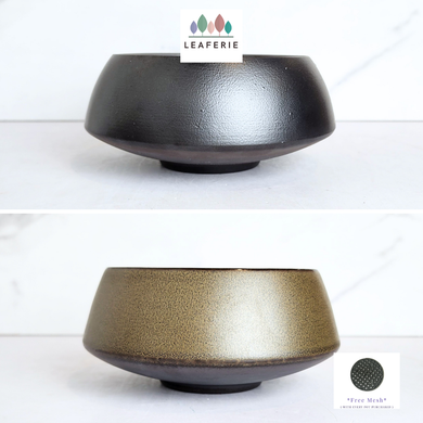 Two ceramic flowerpot with textured finishes on a white background, featuring the Leaferie brand.