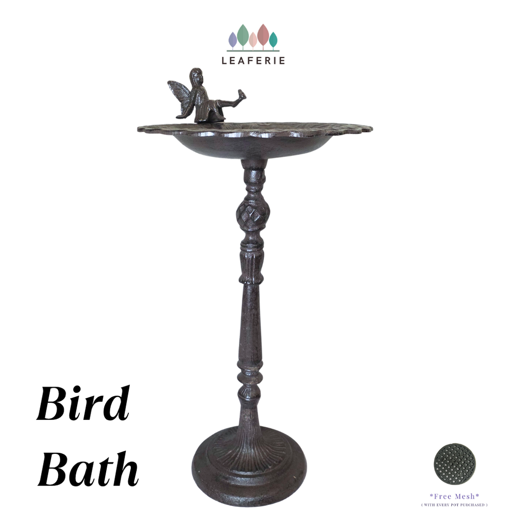 Cast Iron bird bath with a fairy figure on a white background, featuring the Leaferie brand.