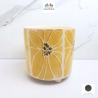 The Leaferie Willow yellow ceramic pot with stand. 