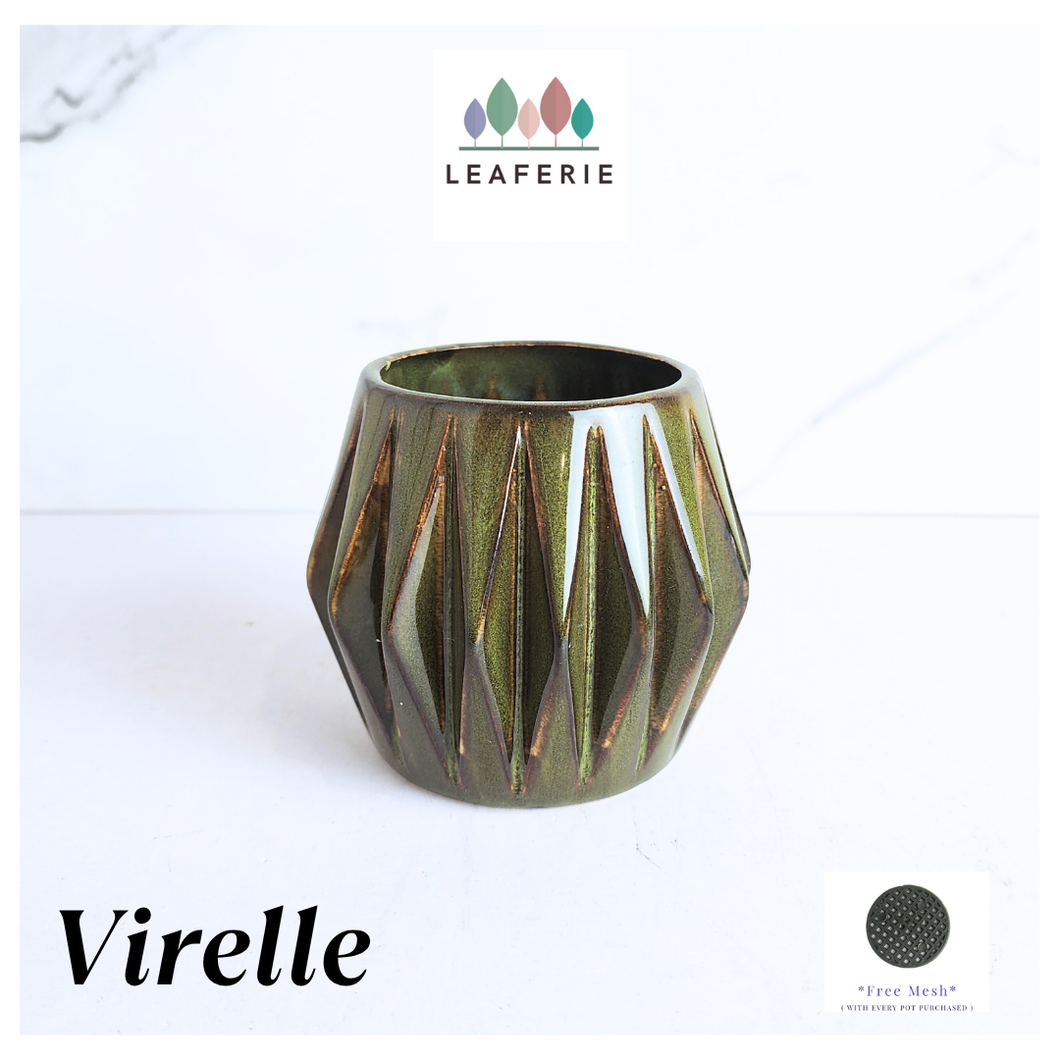 Leaferie Virelle ceramic pot with geometric pattern on a white background, featuring the brand 'LEAFAERIE'.