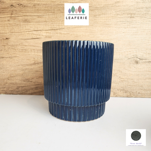 The Leaferie Sonnet blue ceramic pot.