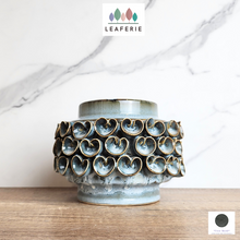 Load image into Gallery viewer, The Leaferie Hera Flowerpot. ceramic blueish pot with petals. 
