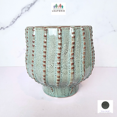 The Leaferie Ruona green bluish ceramic pot