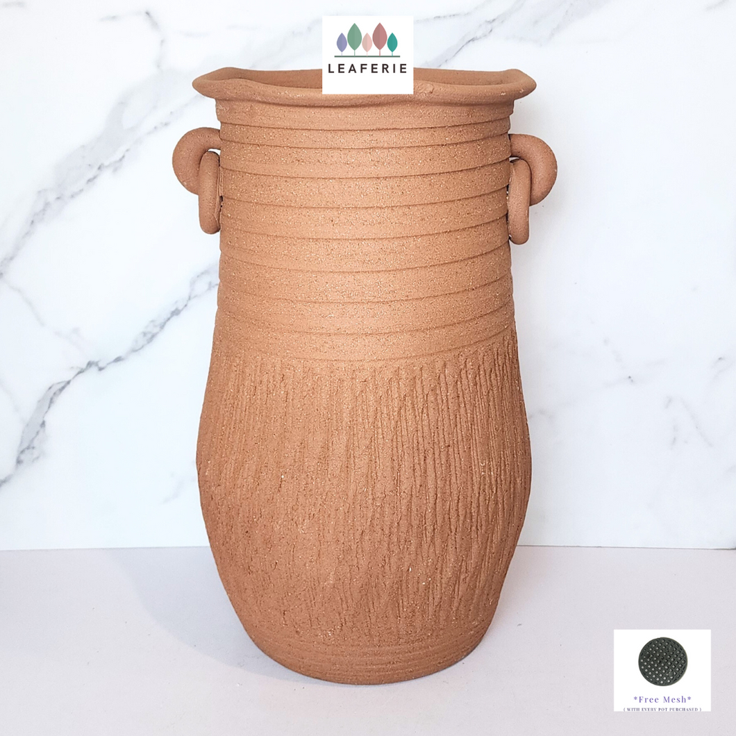 The Leaferie Yett Tall terracotta pot