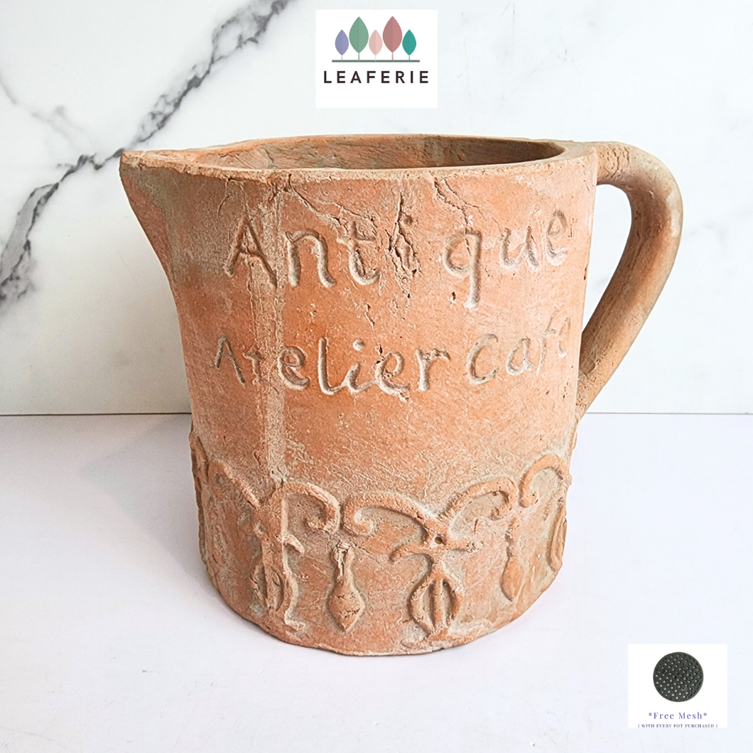 The Leaferie Yari terracotta jug flowerpot